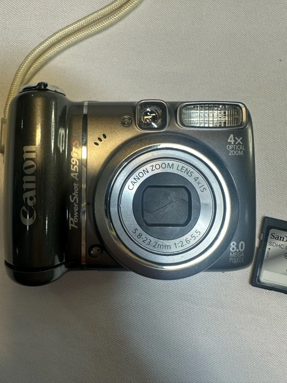 Canon PowerShot A590 IS 8.0 MP Digital Camera Works Well w/Strap & 8GB SD Card
